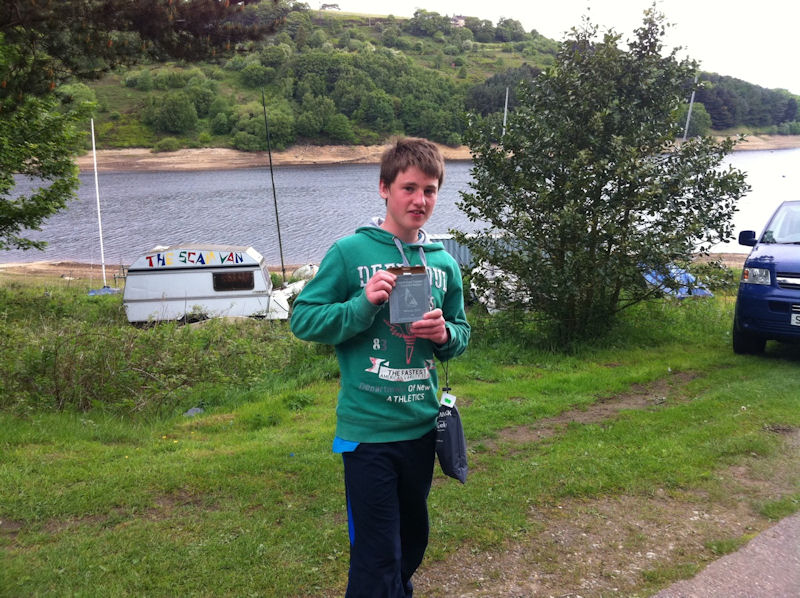 Tom Clayton wins the Scammonden Topper open photo copyright Ian Escritt taken at Scammonden Water Sailing Club and featuring the Topper class