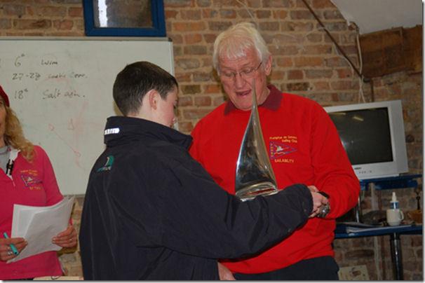 Crispin Beaumont receives trophy from David Greenfield at the first Topper Travellers' open of the year at Frampton on Severn photo copyright Adam McElroy taken at Frampton on Severn Sailing Club and featuring the Topper class