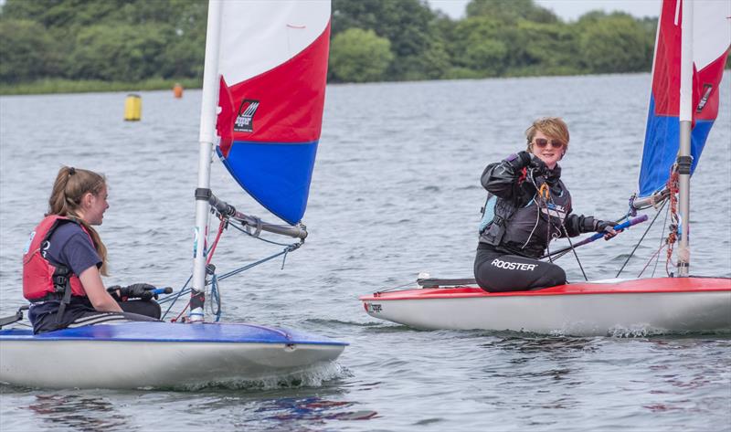 Annabel Turnball and Scarlet Desorgher at end of final race at Topper Midland Championship photo copyright David Eberlin taken at Notts County Sailing Club and featuring the Topper class