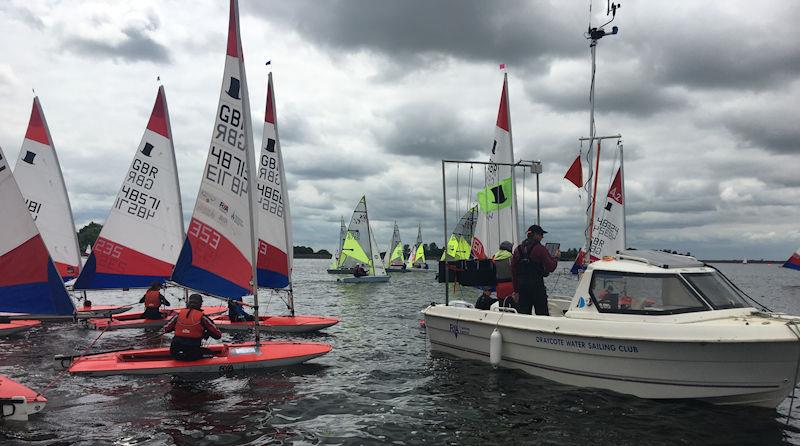 Fleets lining up to start a race at the Regional Junior Championships, Draycote Water SC photo copyright Steve Irish taken at Draycote Water Sailing Club and featuring the Topper class