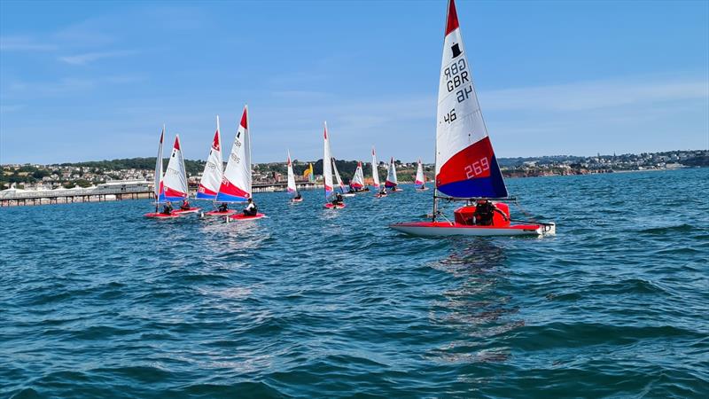 South West Topper coaching and racing at Paignton photo copyright Steve Gilboy taken at Paignton Sailing Club and featuring the Topper class