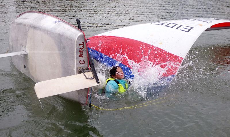 Capsize Drill; essential to know how to recover from this during Solway Yacht Club Cadet Week 2022 photo copyright Becky Davison taken at Solway Yacht Club and featuring the Topper class