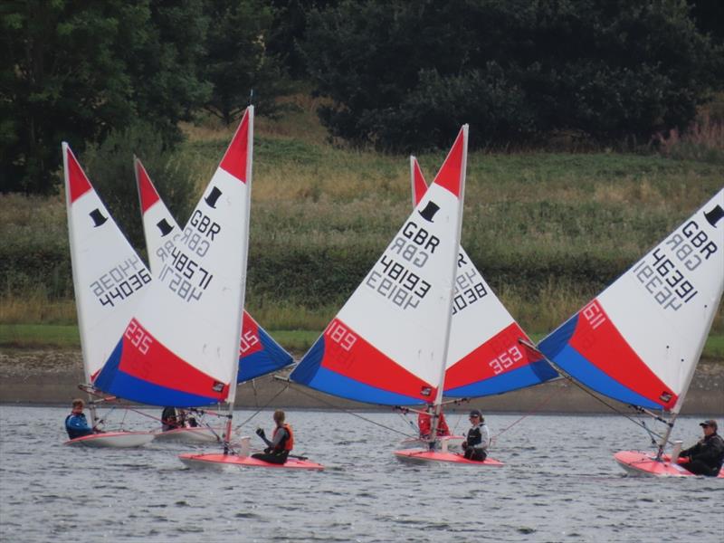 Close sailing on the run during the Midlands Topper Traveller Round 1 at Bartley photo copyright Megan Hardiman taken at Bartley Sailing Club and featuring the Topper class