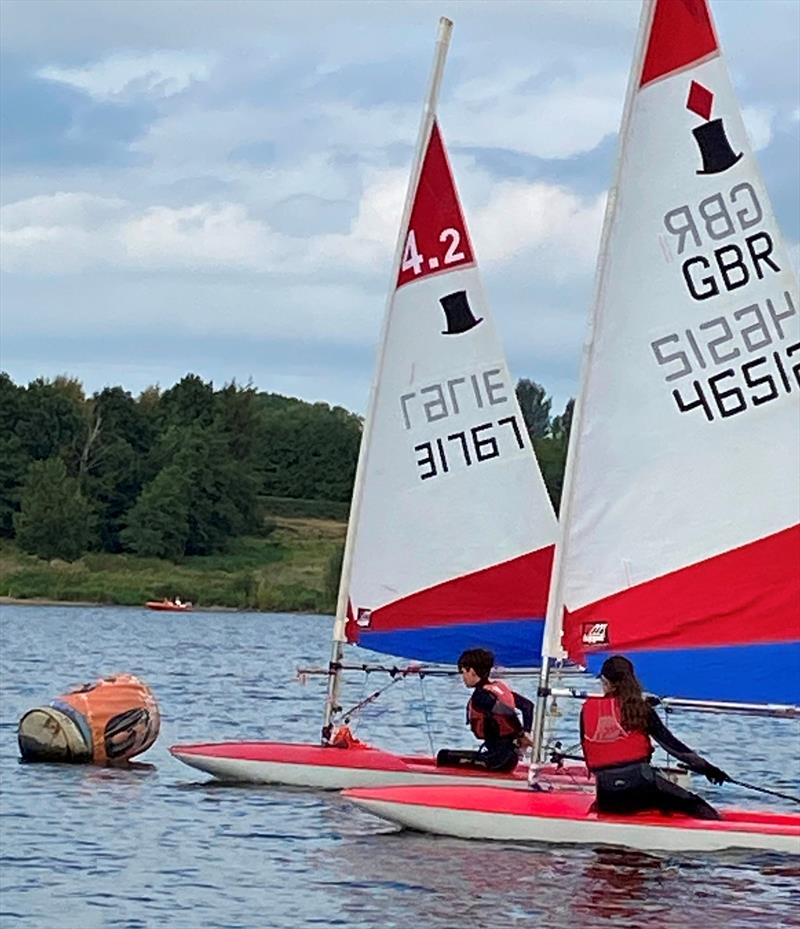 Close mark rounding during Midlands Topper Traveller Round 1 at Staunton Harold photo copyright Tom Mawby-Groom taken at Staunton Harold Sailing Club and featuring the Topper 4.2 class