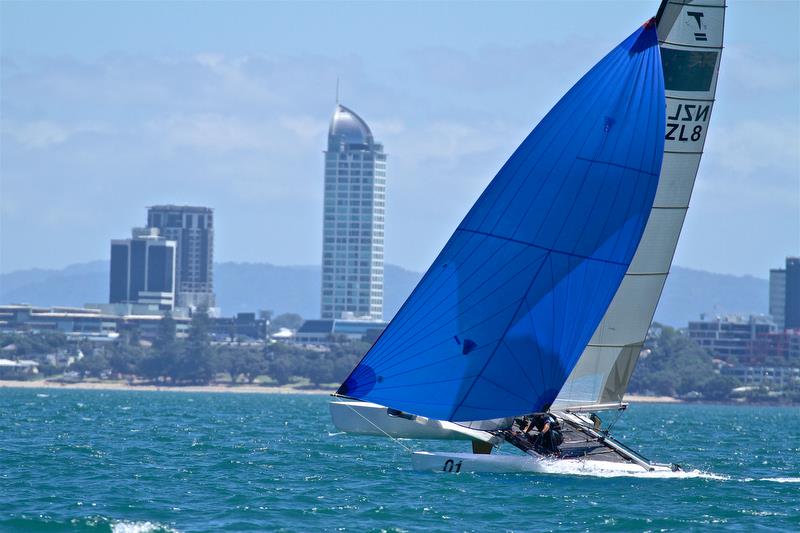 Rex and Brett Sellers - heading for the finish - with Takapuna in the backdrop - Race 6 - Int Tornado Worlds - Day 3, presented by Candida, January 7, photo copyright Richard Gladwell taken at Takapuna Boating Club and featuring the Tornado class
