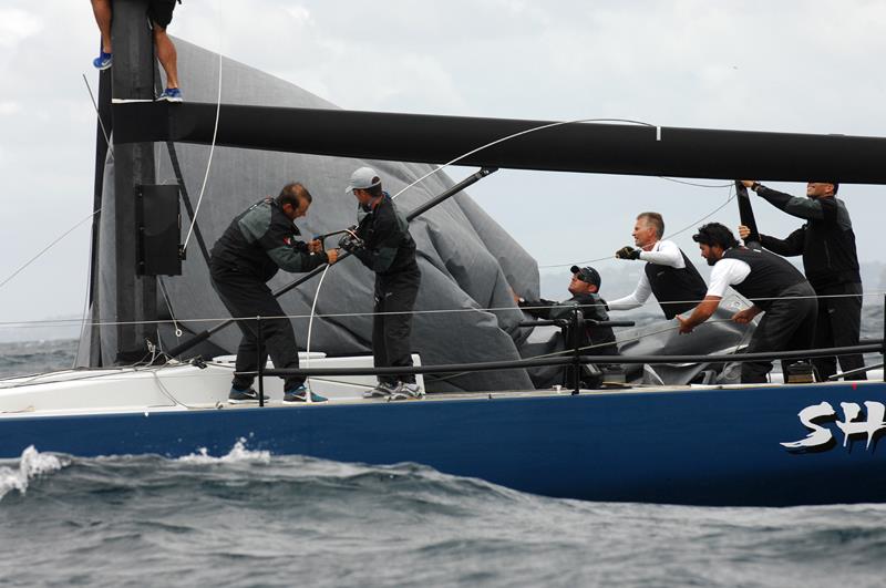 The Shogun crew hacksaw the rig away on day 2 of the final round of the TP52 Southern Cup - photo © Peter Andrews / Outimage