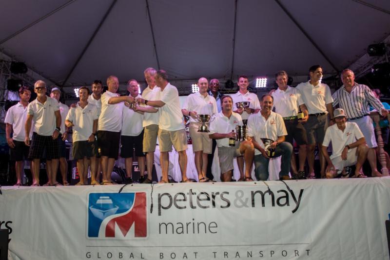 TP52 Zingara (Conviction) collect a haul of silverware at the Peters & May Round Antigua Race Prizegiving photo copyright Ted Martin taken at Antigua Yacht Club and featuring the TP52 class