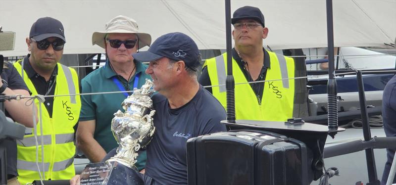A happy owner - Sam Haynes and the Tattersall Cup is his in 2022 photo copyright Clayton Reading taken at Royal Yacht Club of Tasmania and featuring the TP52 class