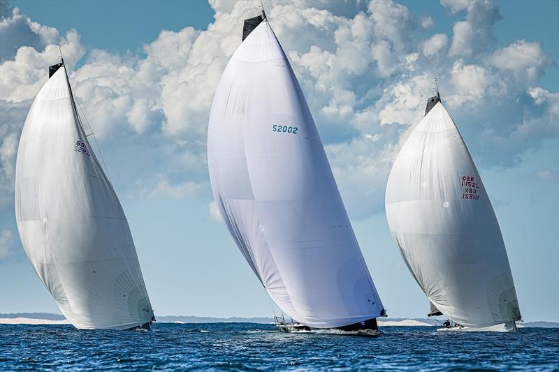 (From left) Smuggler, Quest and Frantic in a downwind duel - 2023 Pallas Capital TP52 Gold Cup Act 2 - Day 1 photo copyright Salty Dingo / SailFest Newcastle taken at Newcastle Cruising Yacht Club and featuring the TP52 class