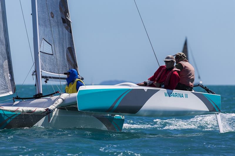 Wilparina III flying on one hull on day 3 of Airlie Beach Race Week 2017 photo copyright Andrea Francolin taken at Whitsunday Sailing Club and featuring the Trimaran class