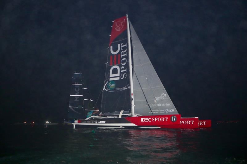 Just 0.1nm separated the two ULTIME boats, IDEC Sport and MACIF as they approached the finish line on Sunday evening in the Route du Rhum-Destination Guadeloupe photo copyright Alexis Courcoux taken at  and featuring the Trimaran class