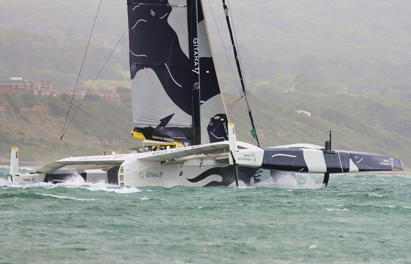 Maxi Edmond de Rothschild passes Hurst Castle after the Rolex Fastnet Race start - photo © Mark Jardine