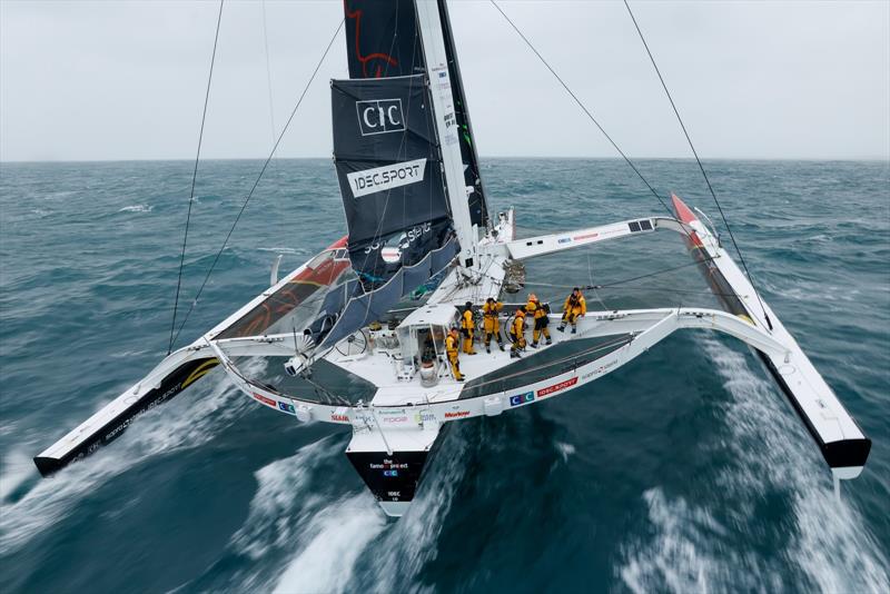Arrival of Alexia Barrier and her crew of The Famous Project CIC Dee Caffari, Annemieke Bes, Deborah Blair, Molly LaPointe, Támara Echegoyen, Stacey Jackson and Rebecca Gmür Hornell – aboard Maxi Trimaran IDEC Sport off Ouessant, after Jules Verne Trophy - photo © Lloyd / Jmliot Images / CIC