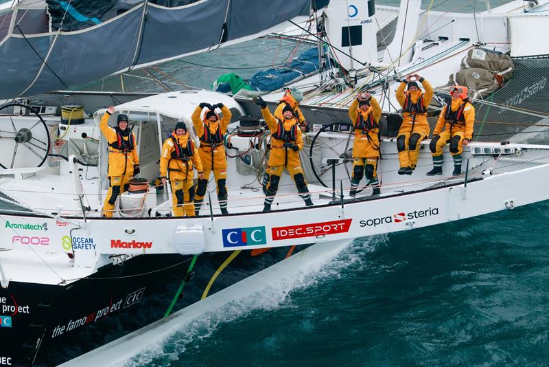 Arrival of Alexia Barrier and her crew of The Famous Project CIC Dee Caffari, Annemieke Bes, Deborah Blair, Molly LaPointe, Támara Echegoyen, Stacey Jackson and Rebecca Gmür Hornell – aboard Maxi Trimaran IDEC Sport off Ouessant, after Jules Verne Trophy - photo © Lloyd / Jmliot Images / CIC