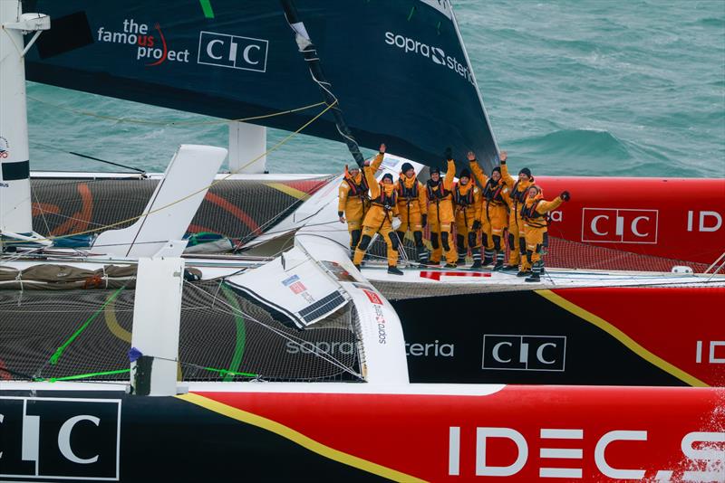 Arrival of Alexia Barrier and her crew of The Famous Project CIC Dee Caffari, Annemieke Bes, Deborah Blair, Molly LaPointe, Támara Echegoyen, Stacey Jackson and Rebecca Gmür Hornell – aboard Maxi Trimaran IDEC Sport off Ouessant, after Jules Verne Trophy - photo © Lloyd / Jmliot Images / CIC