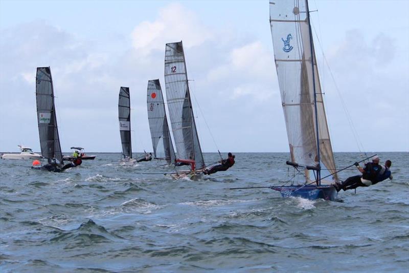 Race 1 start - 2019 Australian 12ft Skiff Championships photo copyright Beryll Roberts taken at Royal Queensland Yacht Squadron and featuring the 12ft Skiff class