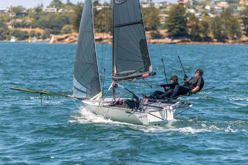 Father and son Jacob and Oliver Smith on Shu-Styx Fabrications during the 2026 Tri Search 12ft Skiff Interdominion Championship photo copyright @sprottmedia taken at Australian 18 Footers League and featuring the 12ft Skiff class