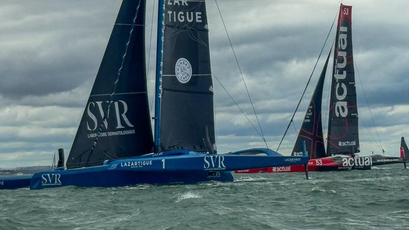 The Ultims SVR Lazartigue and Ultim Actual 3 at the start of the Rolex Fastnet Race - Cowes - July 26, 2025 photo copyright Richard Gladwell - Sail-World.com/nz taken at Royal Ocean Racing Club and featuring the Ultim class