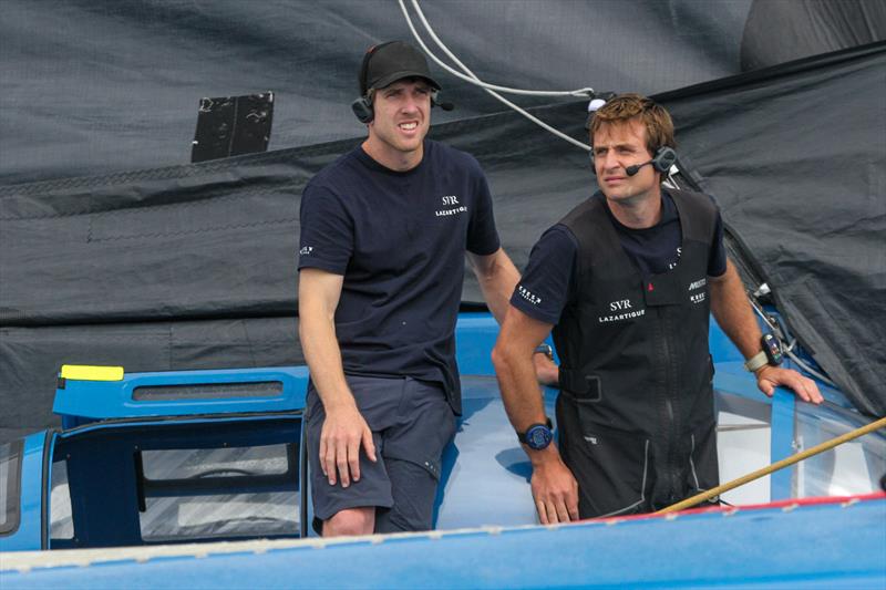 Peter Burling (left) with Tom Lapeche (skipper of the Ultim SVR Lazartigue) - start - Rolex Fastnet - Cowes - July 26, 2025 photo copyright Richard Gladwell - Sail-World.com/nz taken at Royal Ocean Racing Club and featuring the Ultim class