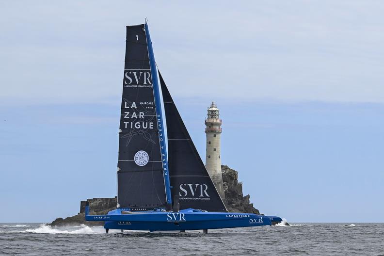 SVR Lazrtigue rounds Fastnet Rock - Rolex Fastnet Race - July 28, 2025 photo copyright Kurt Arrigo / Rolex taken at Royal Ocean Racing Club and featuring the Ultim class