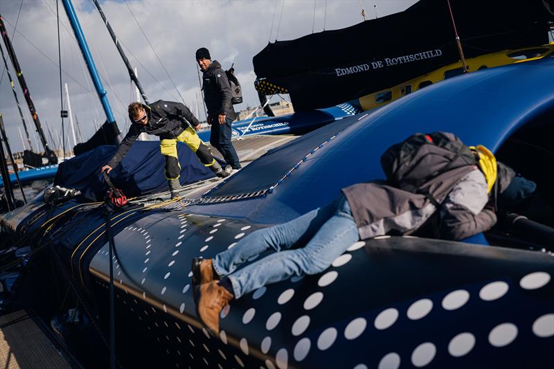 Technicians work on the Ultim class multihull Maxi Edmond de Rothschild Gitana 18 in the Route du Rhum village - photo © Jean-Louis Carli / Route du Rhum / FACTSTORY