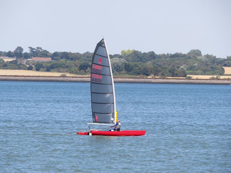 Gary Piper finishing a race during the Unicorn Nationals at Stone photo copyright Julius Mach taken at Stone Sailing Club and featuring the Unicorn class