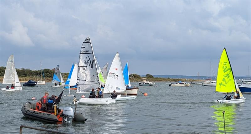A support boat watches on during the Keyhaven YC Junior & Youth Regatta 2022 photo copyright Mark Jardine taken at Keyhaven Yacht Club and featuring the Topaz Vibe class