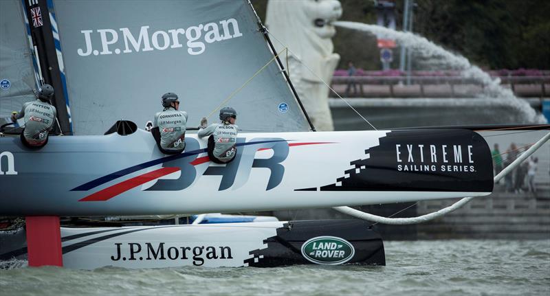 J.P. Morgan BAR fly past Singapore's Merlion waterfall in Marina Bay on day 2 of Extreme Sailing Series Act 1, Singapore - photo © Lloyd Images