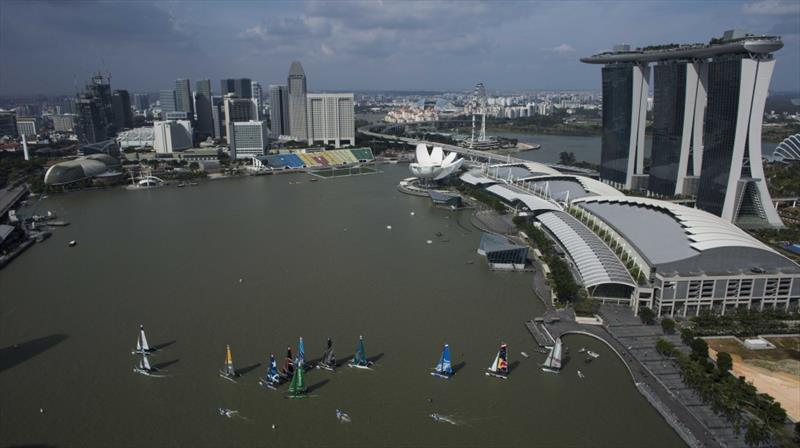 Racing on day 4 of Extreme Sailing Series Act 1, Singapore photo copyright Lloyd Images taken at  and featuring the Extreme 40 class