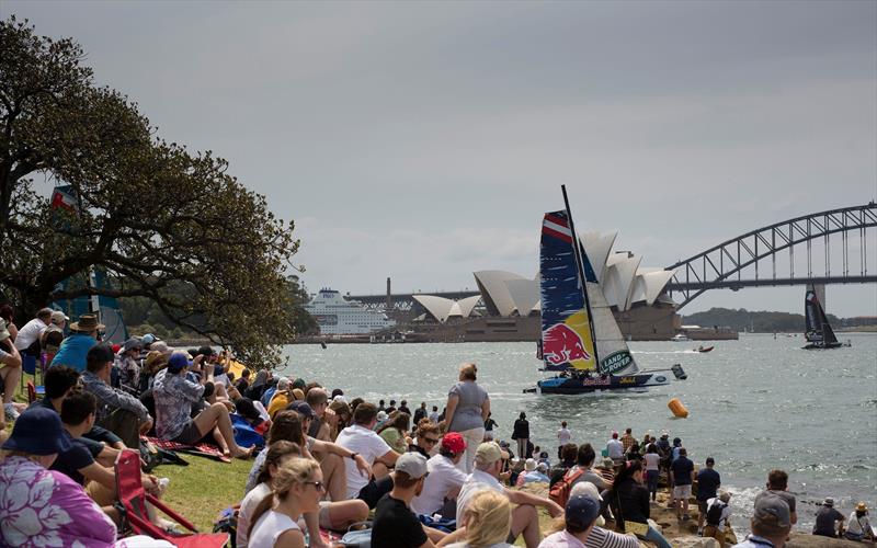 Red Bull Sailing Team fly past the crowds that gathered around the waterfront on the final day in Sydney photo copyright Lloyd Images taken at  and featuring the Extreme 40 class