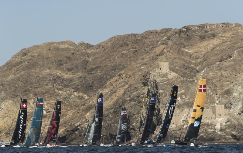 Extreme Sailing Series 2017. Muscat. Oman. The fleet racing close to the shore and historic town of Mutrah - photo © Lloyd Images