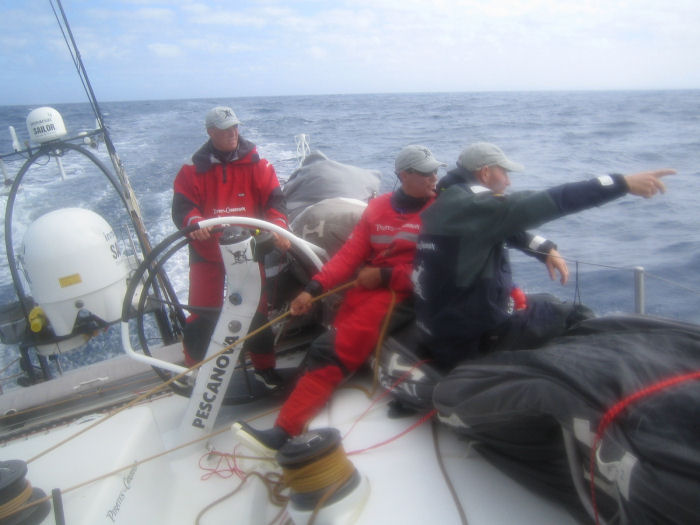 Crewmen on Volvo Open 70 The Black Pearl on watch as they speed into the Southern Ocean on Leg 4 photo copyright Justin Clougher taken at  and featuring the Volvo 70 class