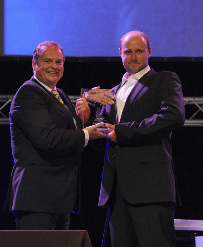 Captain Goran Soderdahl Owners rep, Wallenius Wilhelmsen Logistics South Africa, presents the seamanship award to Delta Lloyd's Martin Watts during the Volvo Ocean Race Leg 1 Prize Giving photo copyright Rick Tomlinson / Volvo Ocean Race taken at  and featuring the Volvo 70 class