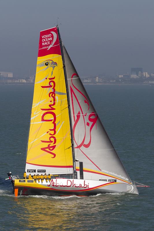 Abu Dhabi Ocean Racing's crew line the rail of Azzam photo copyright Ian Roman / www.ianroman.com taken at  and featuring the Volvo One-Design class