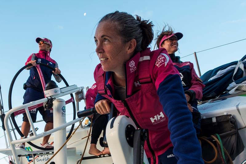 Libby Greenhalgh at the pedestal admiring the sunset during the Volvo Ocean Race photo copyright Corinna Halloran taken at  and featuring the Volvo One-Design class