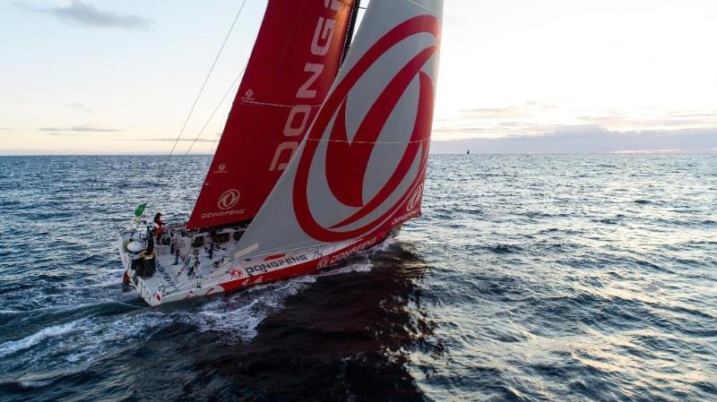 Dongfeng Race Team's VO65 round the Fastnet Rock in the Rolex Fastnet Race photo copyright Jeremie Lecaudey / Volvo Ocean Race taken at Royal Ocean Racing Club and featuring the Volvo One-Design class