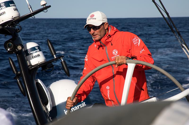Jeremie on the helm of Dongfeng during Volvo Ocean Race Leg 1: Alicante to Lisbon photo copyright Rich Edwards / Volvo Ocean Race taken at  and featuring the Volvo One-Design class