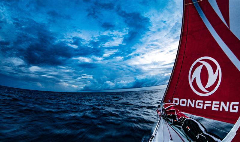 Sunset showers on board Dongfeng during Volvo Ocean Race Leg 2: Lisbon to Cape Town photo copyright Jeremie Lecaudey / Volvo Ocean Race taken at  and featuring the Volvo One-Design class