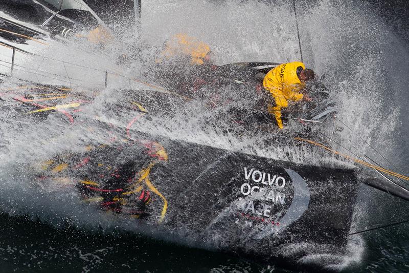 Wade Morgan on the bow of Abu Dhabi Ocean Racing - photo © Ian Roman / www.ianroman.com
