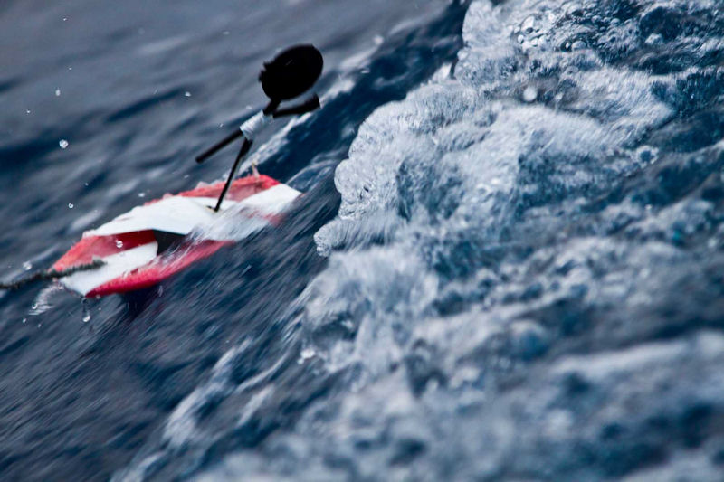 Ryan Godfrey's surfer invention takes to the stern wave during some downtime while motoring to Tristan da Cunha for a rendezvous with the PUMA shore team and a freighter to Cape Town photo copyright Amory Ross / PUMA Ocean Racing / Volvo Ocean Race taken at  and featuring the Volvo 70 class