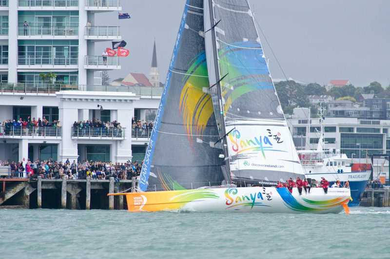 Team Sanya sail past thousands of spectators at the start of leg 5 of the Volvo Ocean Race photo copyright Marc Bow / Volvo Ocean Race taken at  and featuring the Volvo 70 class