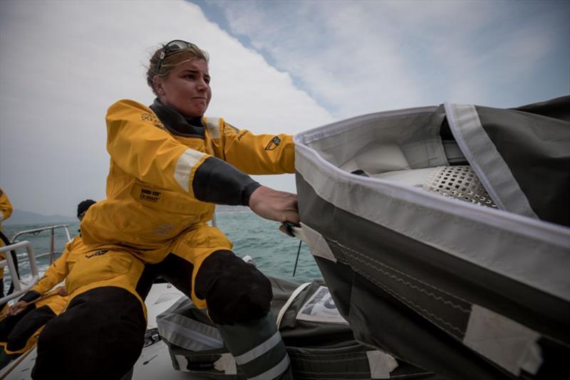 Volvo Ocean Race Leg 6 to Auckland, day 1 on board Turn the Tide on Plastic. Bianca Cook stacking on the way out photo copyright James Blake / Volvo Ocean Race taken at  and featuring the Volvo One-Design class