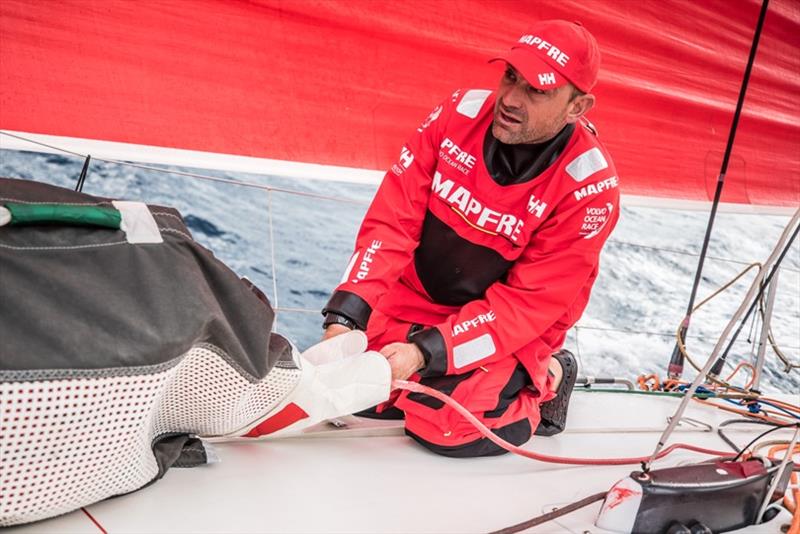 Volvo Ocean Race Leg 6 to Auckland, Day 2 on board MAPFRE, Xabi Fernandez setting up the seets of a sail. 08 February photo copyright Ugo Fonolla / Volvo Ocean Race taken at  and featuring the Volvo One-Design class
