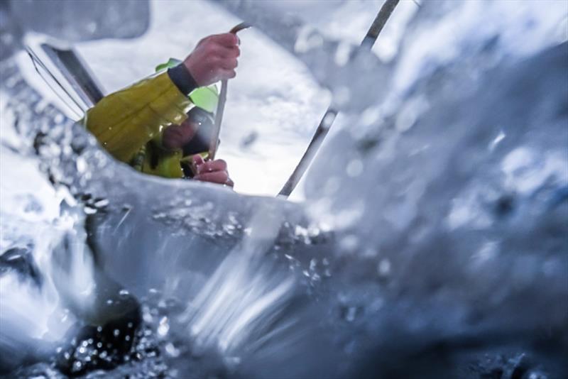 Volvo Ocean Race Leg 7 from Auckland to Itajai, day 04 on board Brunel. Peter Burling doing something, but I don't know what, as I obviously was on the other side of the water curtain. 21 March photo copyright Yann Riou / Volvo Ocean Race taken at  and featuring the Volvo One-Design class