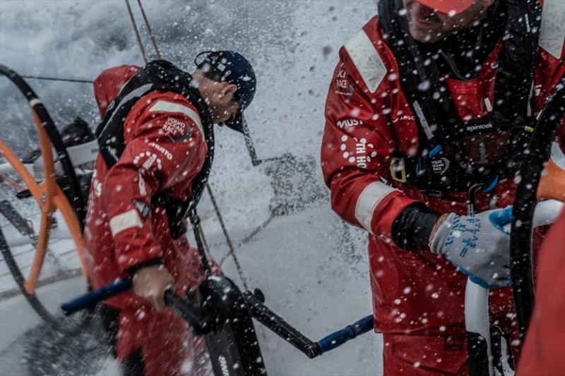 Volvo Ocean Race Leg 9, from Newport to Cardiff, day 2, on board Vestas 11th Hour. Charlie Enright and Tom Johnson holding on photo copyright James Blake / Volvo Ocean Race taken at  and featuring the Volvo One-Design class