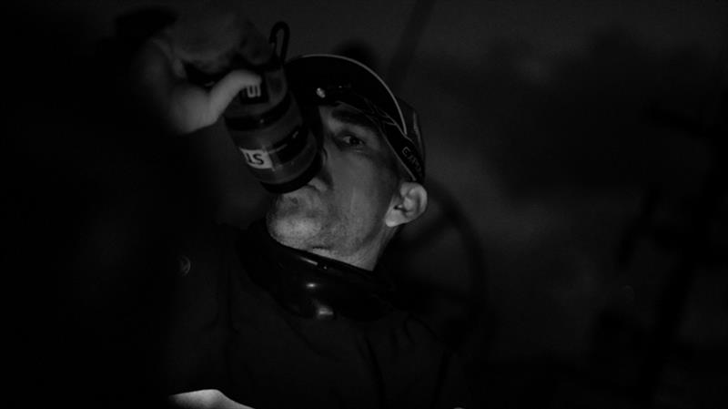 Volvo Ocean Race Leg 9, from Newport to Cardiff, day 03, on board Dongfeng. Stu Bannatyne drinking before stacking. - photo © Jeremie Lecaudey / Volvo Ocean Race