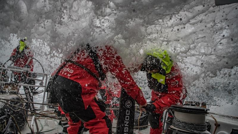 Volvo Ocean Race Leg 9, from Newport to Cardiff, day 05, on board Dongfeng. Horace and Stu unnder water grinding. - photo © Jeremie Lecaudey / Volvo Ocean Race