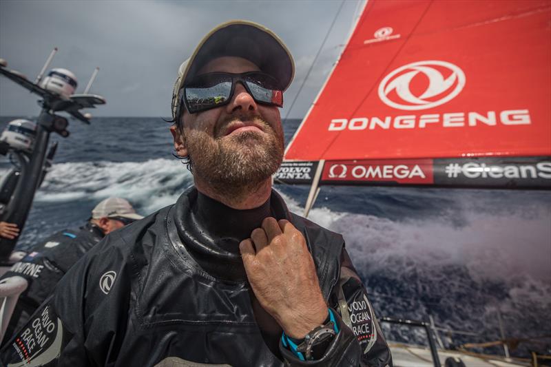 Leg 8 from Itajai to Newport, day 10 on board Dongfeng. 01 May, . Daryl Wislang opens his wet weather gear photo copyright Jeremie Lecaudey / Volvo Ocean Race taken at  and featuring the Volvo One-Design class