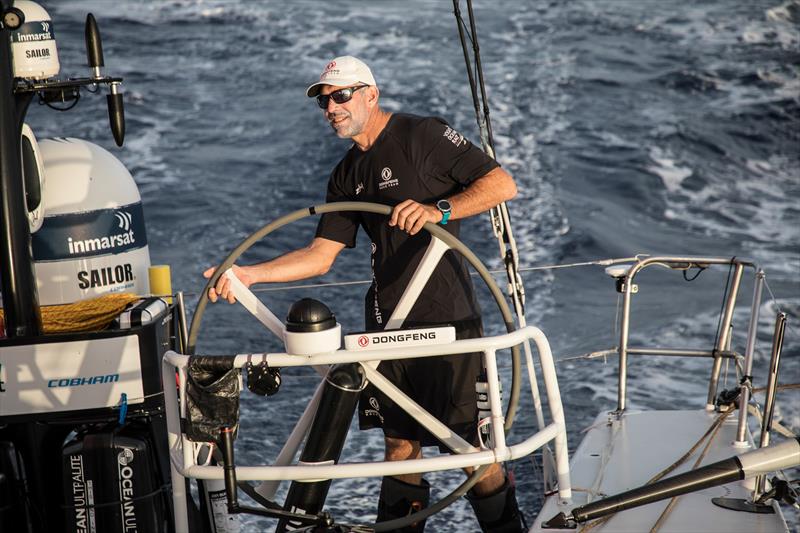 Leg 01, Alicante to Lisbon. Stuart on the helm enroute to the waypoint, photo copyright Rich Edwards / Volvo Ocean Race taken at  and featuring the Volvo One-Design class