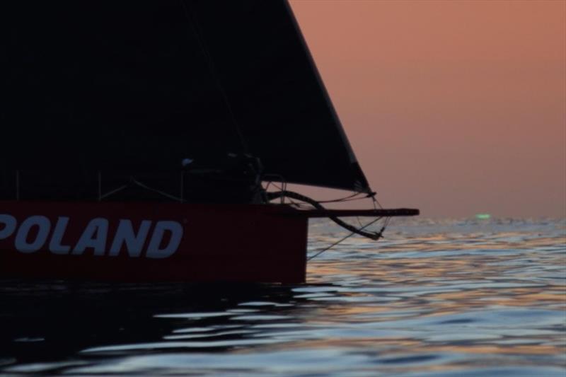 Look to the right of the photo - Green flash at Barbuda mark! Race photographer Tim Wright captured I Love Poland Volvo Open 70 as the sun disappeared completely from view, leaving last glimmer which appeared startlingly green - RORC Caribbean 600, day 2 photo copyright Tim Wright / photoaction.com taken at Royal Ocean Racing Club and featuring the Volvo 70 class